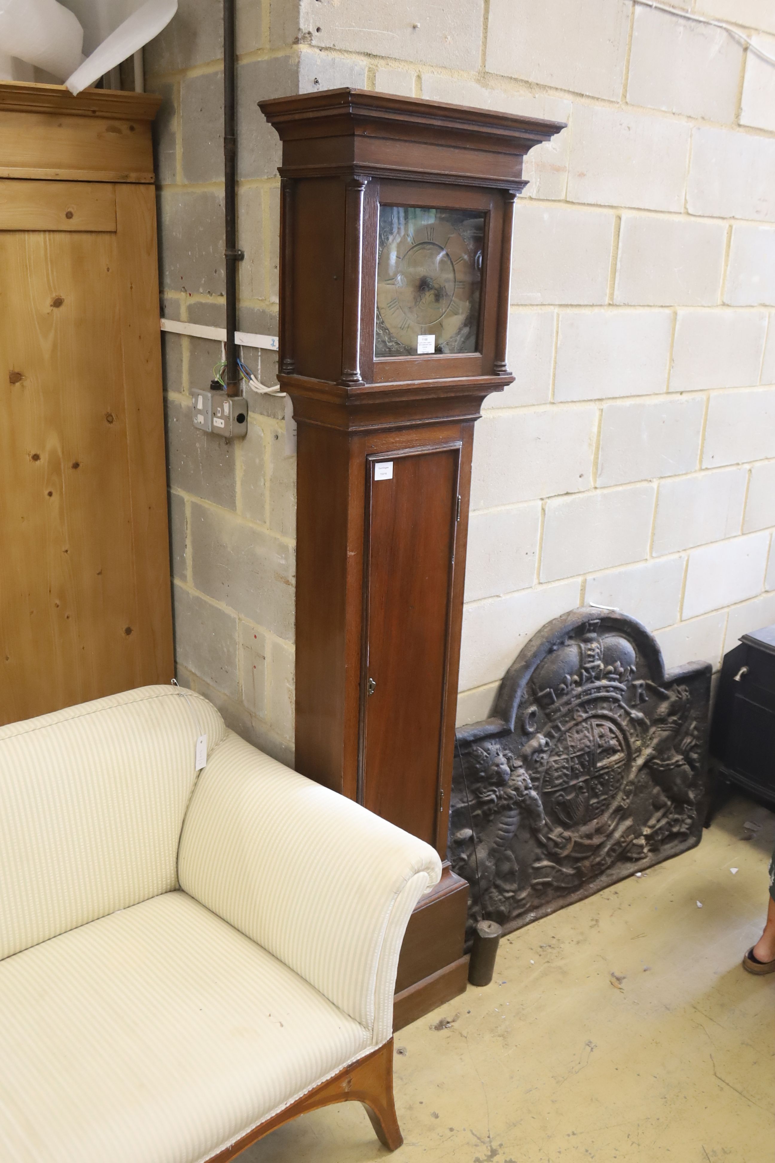 An early 19th century oak eight day longcase clock, marked Cousens Langport, height 194cm
